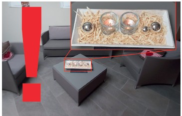 Auf einem Tisch steht eine Dekoschale mit Hobelspänen.